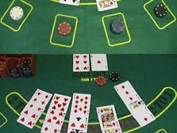 Studio live dealer cemarawin dengan meja roulette dan dealer profesional